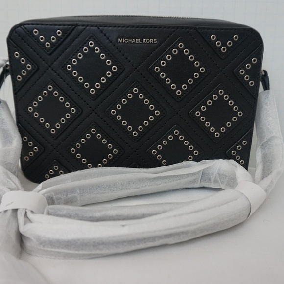 Michael Kors Handbags - Michael Kors Ginny Grommeted Leather Crossbody